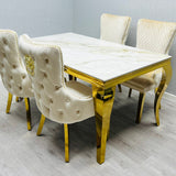 Louis Gold Pandora Gold Ceramic Marble Dining Table With Shimmer Gold Lion Knocker Dining Chairs