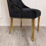 Louis 130cm Black and Gold Round Marble Dining Table with 4 Black & Gold Lion Knocker Velvet Chairs (Special Offer)